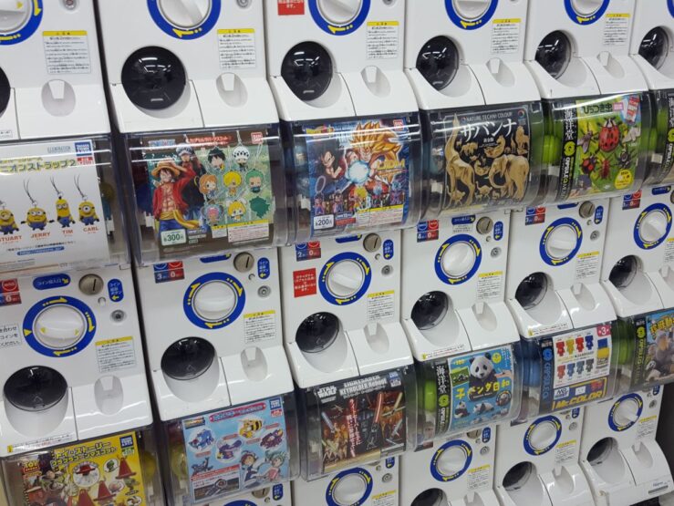 Gachapon vending machines inside a shop in Akihabara, filled with anime-themed capsule toys and collectables