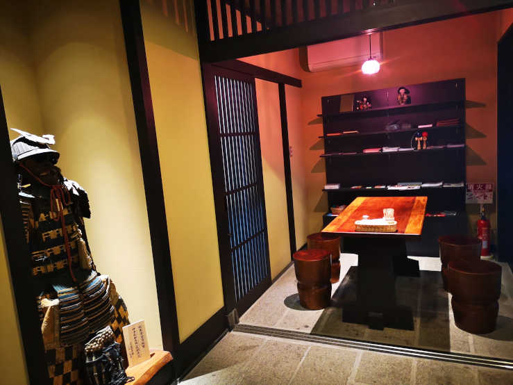 Interior of a Tokyo ryokan with traditional Japanese decor and an onsen-style bath