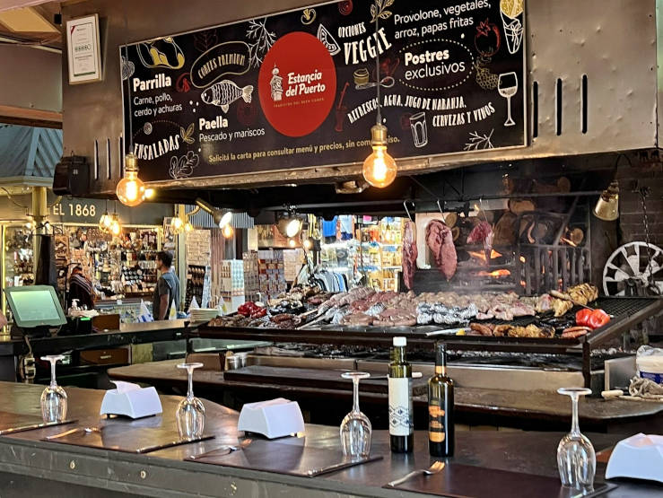 Grilling meats in Mercado del Puerto, Montevideo, Uruguay