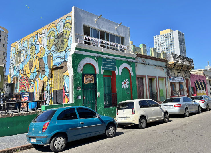 Street in Montevideo featuring colonial buildings and Afro-Uruguayan culture, illustrating overlapping historical and cultural layers