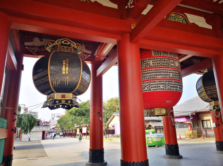Sensoji Temple in Asakusa Tokyo with traditional architecture and visitors in the background