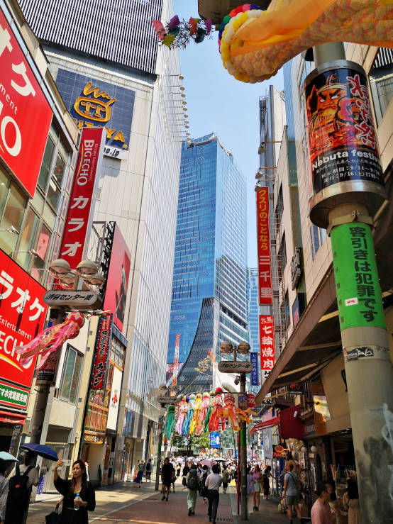 Shibuya Sky building in Tokyo seen from street level near Shibuya Crossing