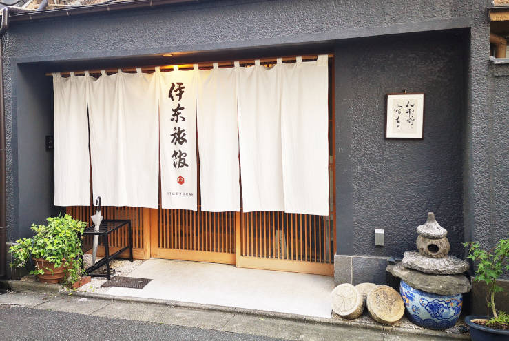 Traditional ryokan entrance in Tokyo with noren curtains