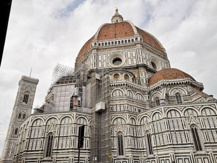 Florence Cathedral (Duomo) with restoration work on part of the roof in Piazza del Duomo
