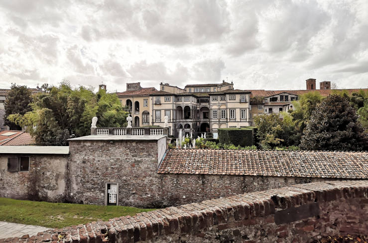 View from Lucca's Renaissance walls across the peaceful neighbourhoods within and around the historic centre in Tuscany, Italy