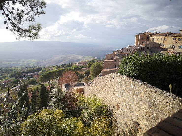 Ancient city wall overlooking the Tuscan landscape in Volterra