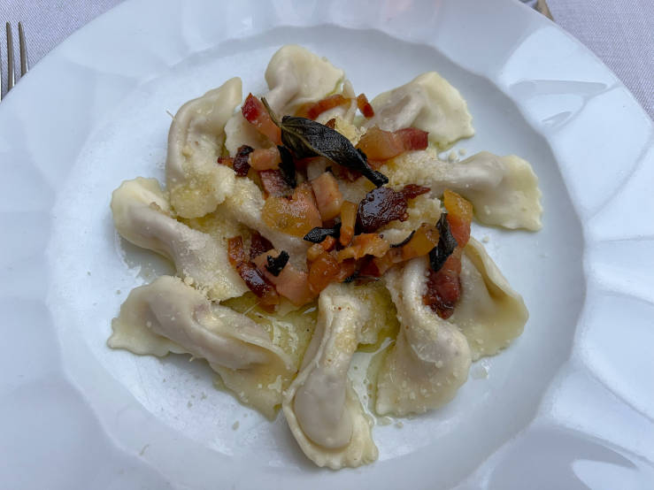 Traditional Bergamo dishes including casoncelli